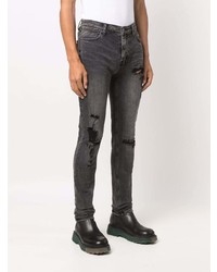 dunkelgraue enge Jeans mit Destroyed-Effekten von Ksubi