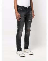 dunkelgraue enge Jeans mit Destroyed-Effekten von purple brand