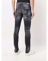 dunkelgraue enge Jeans mit Destroyed-Effekten von Dondup