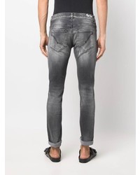 dunkelgraue enge Jeans mit Destroyed-Effekten von Dondup