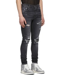 dunkelgraue enge Jeans mit Destroyed-Effekten von Amiri