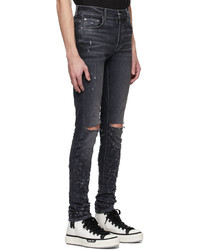 dunkelgraue enge Jeans mit Destroyed-Effekten von Amiri