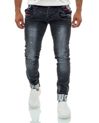 dunkelgraue enge Jeans mit Destroyed-Effekten von KINGZ