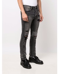 dunkelgraue enge Jeans mit Destroyed-Effekten von Ksubi