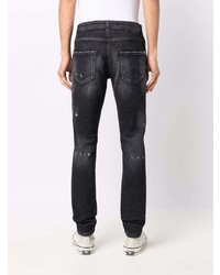 dunkelgraue enge Jeans mit Destroyed-Effekten von John Richmond