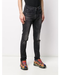 dunkelgraue enge Jeans mit Destroyed-Effekten von Philipp Plein