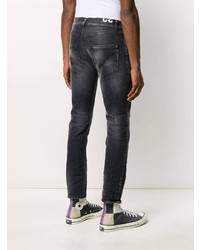 dunkelgraue enge Jeans mit Destroyed-Effekten von Dondup