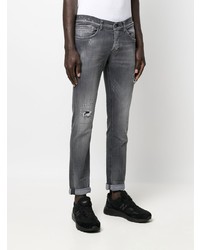 dunkelgraue enge Jeans mit Destroyed-Effekten von Dondup