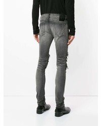 dunkelgraue enge Jeans mit Destroyed-Effekten von Fagassent