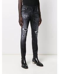 dunkelgraue enge Jeans mit Destroyed-Effekten von DSQUARED2