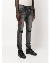 dunkelgraue enge Jeans mit Destroyed-Effekten von Ksubi