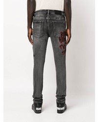 dunkelgraue enge Jeans mit Destroyed-Effekten von Ksubi