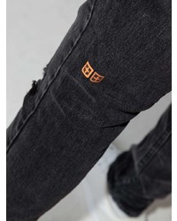 dunkelgraue enge Jeans mit Destroyed-Effekten von Ksubi