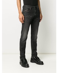 dunkelgraue enge Jeans mit Destroyed-Effekten von Diesel