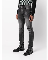 dunkelgraue enge Jeans mit Destroyed-Effekten von Ksubi