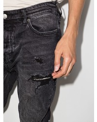 dunkelgraue enge Jeans mit Destroyed-Effekten von Ksubi