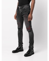 dunkelgraue enge Jeans mit Destroyed-Effekten von Ksubi