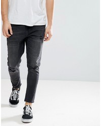 dunkelgraue Jeans mit Destroyed-Effekten von Bershka