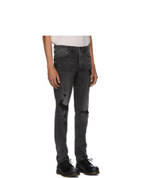 dunkelgraue Jeans mit Destroyed-Effekten von Ksubi