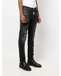 dunkelgraue Jeans mit Destroyed-Effekten von Philipp Plein