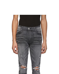 dunkelgraue Jeans mit Destroyed-Effekten von Amiri