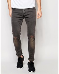 dunkelgraue Jeans mit Destroyed-Effekten