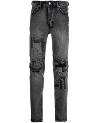 dunkelgraue Jeans mit Destroyed-Effekten von Ksubi