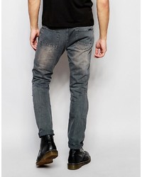 dunkelgraue Jeans mit Destroyed-Effekten