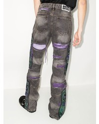 dunkelgraue Jeans mit Destroyed-Effekten von Who Decides War