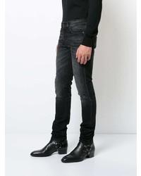 dunkelgraue Jeans mit Destroyed-Effekten von Saint Laurent