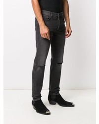 dunkelgraue Jeans mit Destroyed-Effekten von Givenchy