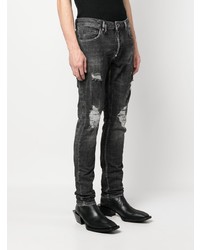 dunkelgraue Jeans mit Destroyed-Effekten von Philipp Plein