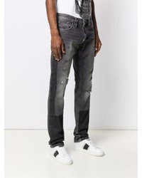 dunkelgraue Jeans mit Destroyed-Effekten von Philipp Plein