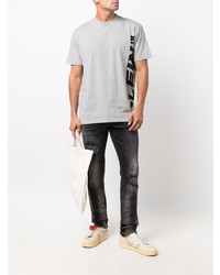 dunkelgraue Jeans mit Destroyed-Effekten von Philipp Plein