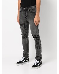 dunkelgraue Jeans mit Destroyed-Effekten von Ksubi