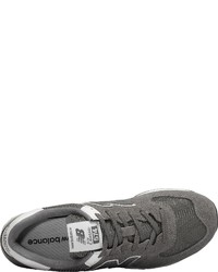 dunkelgraue niedrige Sneakers von New Balance