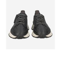 dunkelgraue Sportschuhe von Clarks