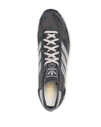 dunkelgraue Sportschuhe von adidas