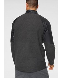 dunkelgrauer Pullover mit einem Reißverschluss am Kragen von Under Armour