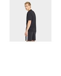 dunkelgraues T-Shirt mit einem Rundhalsausschnitt von adidas Performance