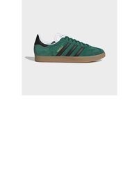 dunkelgrüne Wildleder niedrige Sneakers von adidas Originals
