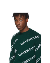 dunkelgrüner bedruckter Pullover mit einem Rundhalsausschnitt von Balenciaga