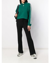 dunkelgrüner bedruckter Pullover mit einer Kapuze von adidas