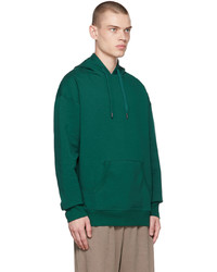 dunkelgrüner Pullover mit einem Kapuze von Reebok Classics