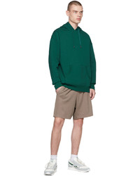 dunkelgrüner Pullover mit einem Kapuze von Reebok Classics