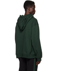 dunkelgrüner Pullover mit einem Kapuze von Dries Van Noten