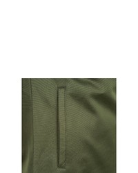 dunkelgrüner Pullover mit einem Kapuze von New Balance