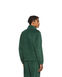 dunkelgrüner Pullover mit einem Reißverschluss am Kragen von CARHARTT WORK IN PROGRESS