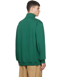 dunkelgrüner Pullover mit einem Reißverschluss am Kragen von YMC