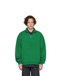 dunkelgrüner Pullover mit einem Reißverschluss am Kragen von Han Kjobenhavn